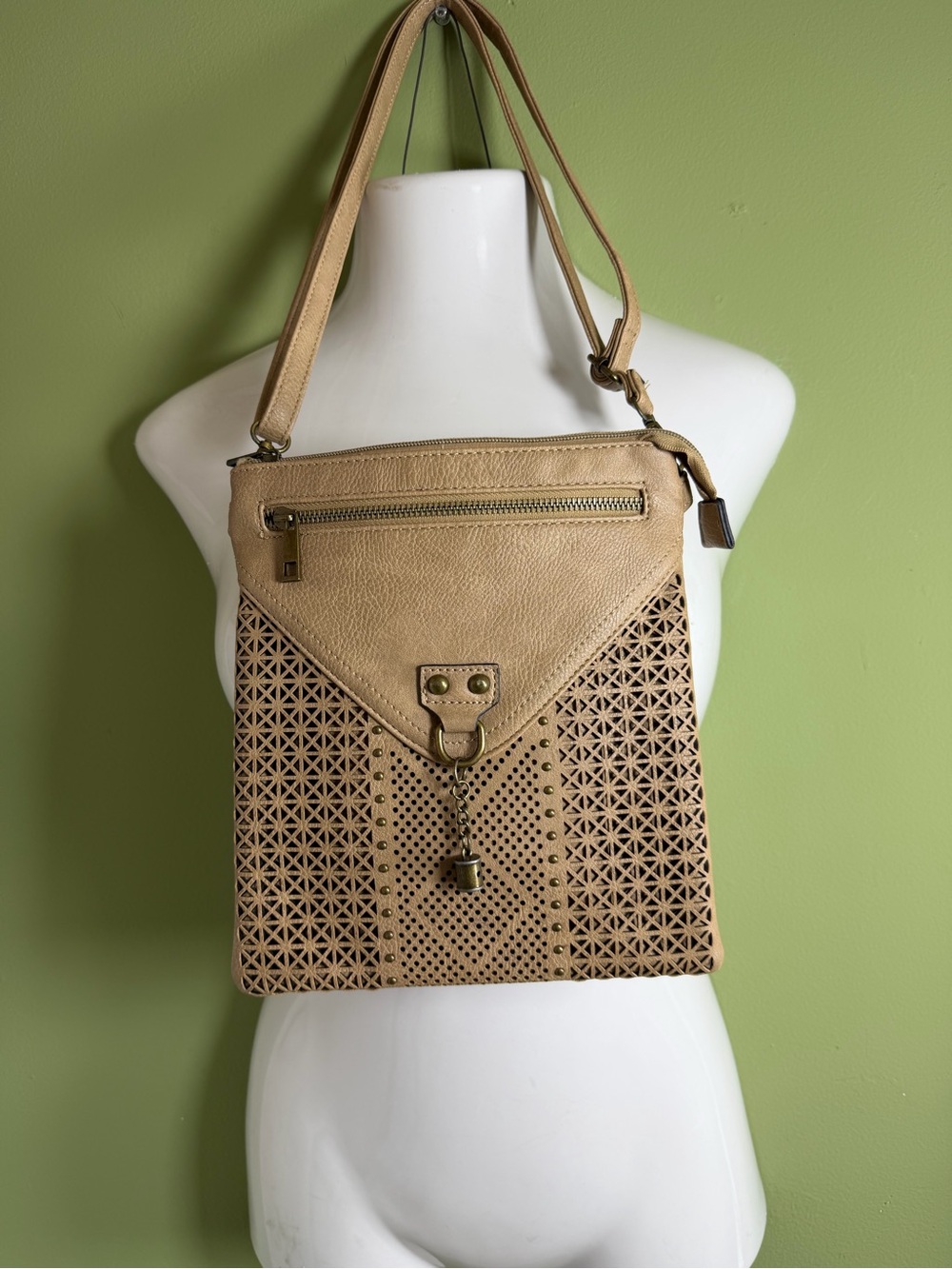 Beige Laser-Cut Crossbody Bag with Tassel Accent